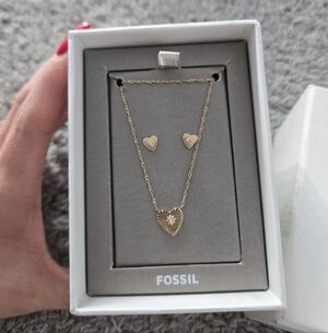 Fossil gold-tone sunray heart necklace and earring set. Stainless Steel. New.